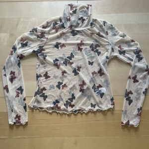 Butterfly Mesh Turtleneck
